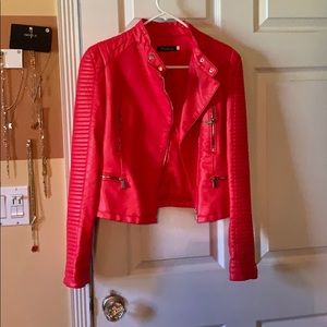 Red faux leather jacket.
